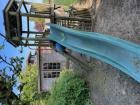 Houten speelhuis met glijbaan Crazy Climber