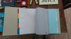 Medaille, boeken, multomap 