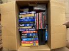 Doos met DVD en video banden 