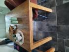 eettafel met bijpassende bank van teak hout