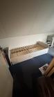 Wit 1 persoons bed met laden