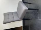 4 stoelen met grijze stof bekleed