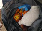 Zak met knuffels voor kinderen.