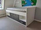 Verhoogd bed met opbergruimte