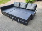 Zit/slaapbank 2.20m×1.50 m Nergens stuk, bekleding zwart/skai