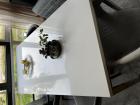 Design eettafel, rvs onderstel en wit hoogglans melamine blad