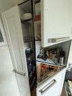 Deel keukenkast met schuiflade en inbouw koelkast 